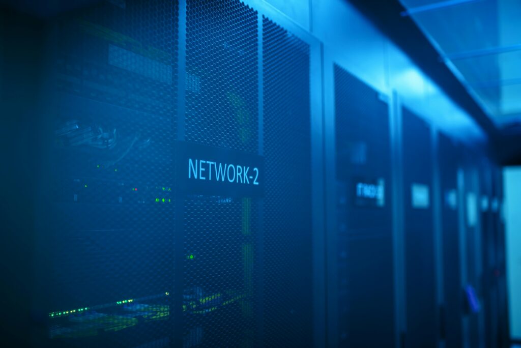 pexels-photo-17323801-17323801 A modern server room featuring network equipment with blue illumination. Ideal for technology themes.